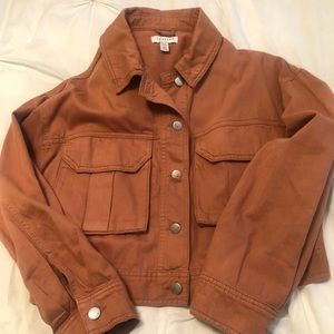 Topshop denim type jacket/size small/color is a brownish orange.